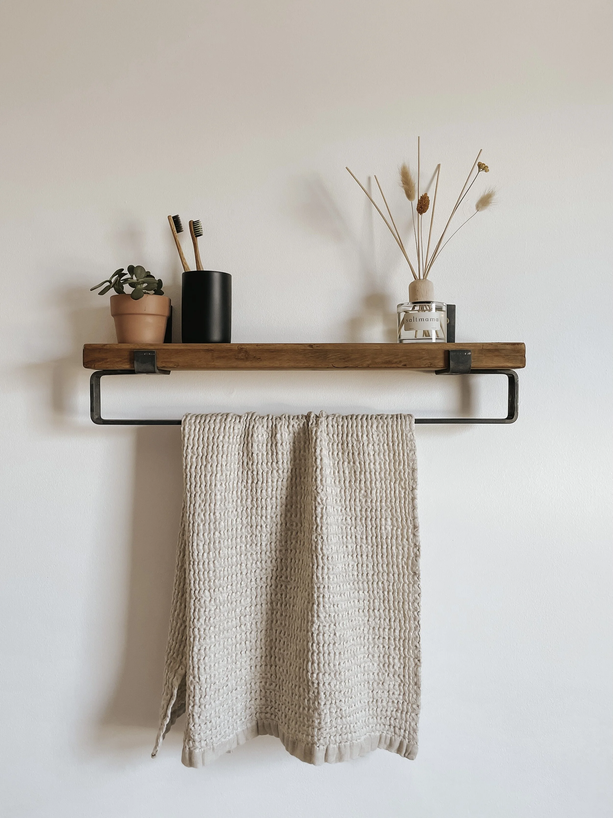 Bath shelf with outlet towel bar